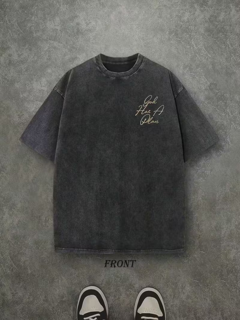 Black t-shirt with text on a gray textured background